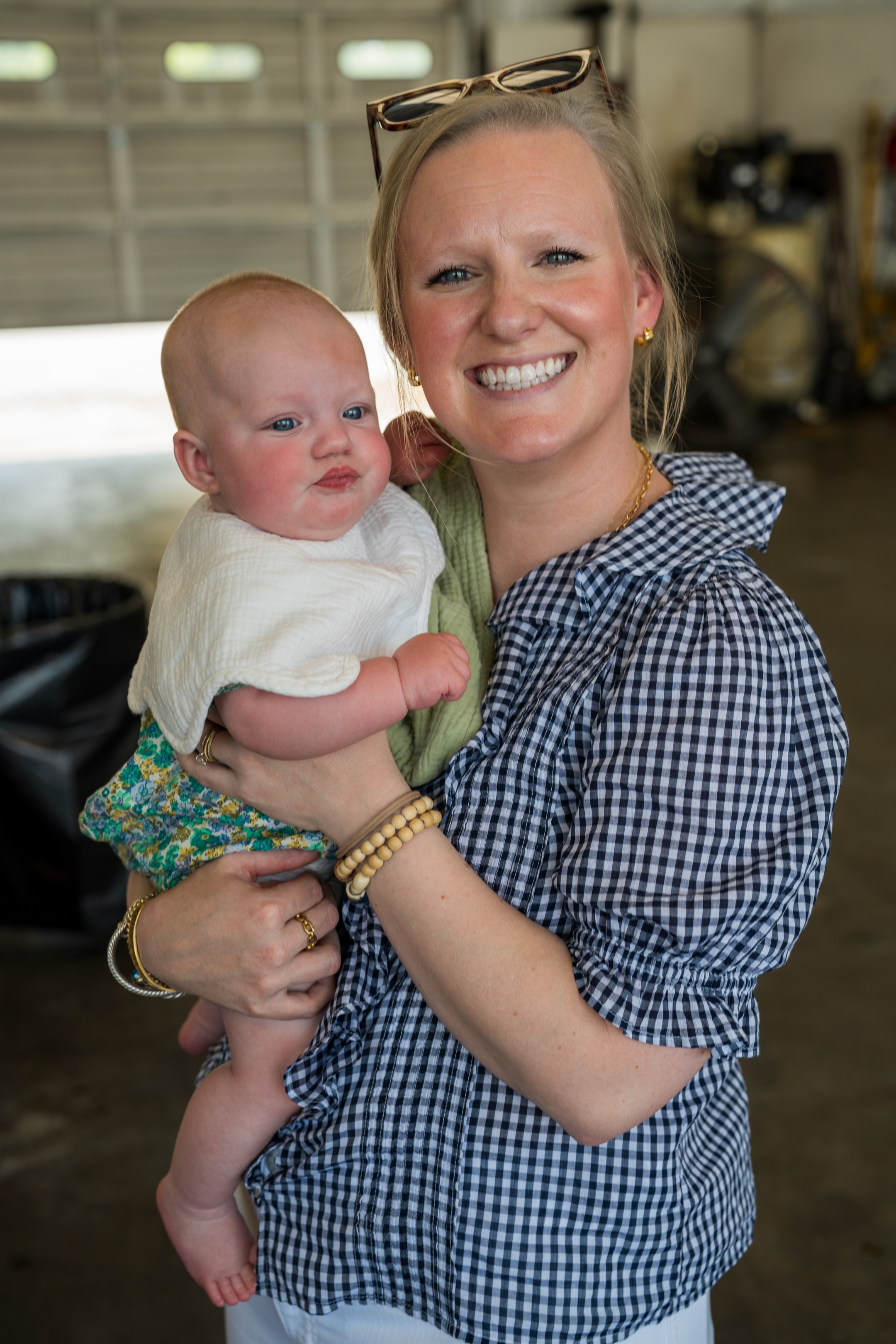 Mom and baby in truck repair shop